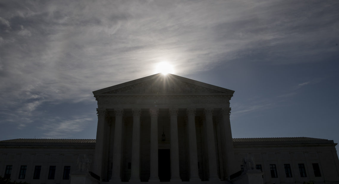 FILE - This May 4, 2020, file photo shows the Supreme Court building in Washington. Controversial Trump administration policies on the census, asylum seekers and the border wall, held illegal by lower courts, are on the Supreme Court's agenda Friday, Oct. 16, 2020. (AP Photo/Andrew Harnik