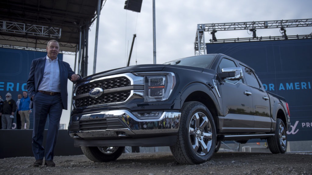 Bill Ford, executive chairman of Ford Motor Co., with the 2021 Ford F-150 King Ranch truck in September in Dearborn, Mich. Strong demand for high-margin vehicles such as pickups has propelled Ford and its rivals to remarkably strong earnings this past quarter. CREDIT: Nic Antaya/Getty Images