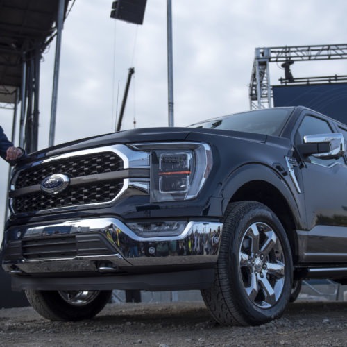 Bill Ford, executive chairman of Ford Motor Co., with the 2021 Ford F-150 King Ranch truck in September in Dearborn, Mich. Strong demand for high-margin vehicles such as pickups has propelled Ford and its rivals to remarkably strong earnings this past quarter. CREDIT: Nic Antaya/Getty Images