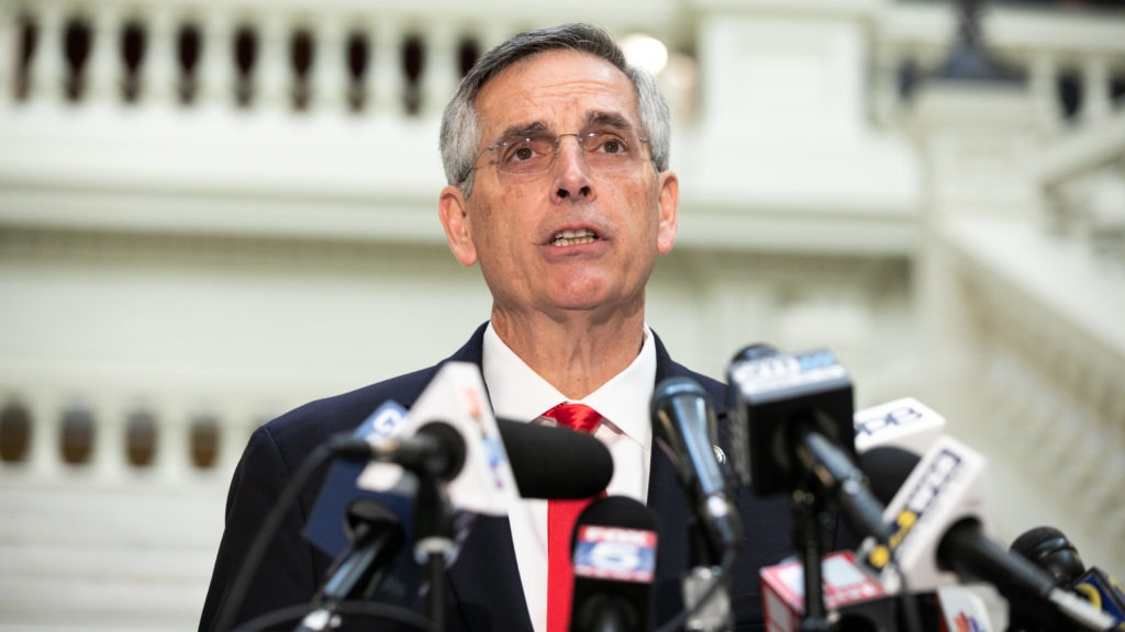 Georgia Secretary of State Brad Raffensperger holds a press conference earlier this month. Despite pressure from some fellow Republicans, Raffensperger has certified President-elect Joe Biden's victory in the state. CREDIT: Jessica McGowan/Getty Images