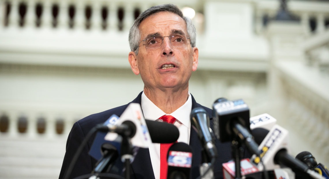 Georgia Secretary of State Brad Raffensperger holds a press conference earlier this month. Despite pressure from some fellow Republicans, Raffensperger has certified President-elect Joe Biden's victory in the state. CREDIT: Jessica McGowan/Getty Images