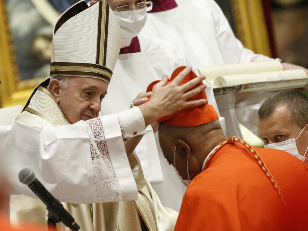 Archbishop Wilton Gregory of Washington, D.C., becomes a cardinal during a ceremony Saturday known as a consistory in St. Peter's Basilica at the Vatican. Pope Francis cautioned new cardinals never to lose their connection to the people. CREDIT: Fabio Frustaci/Pool/AFP via Getty Images
