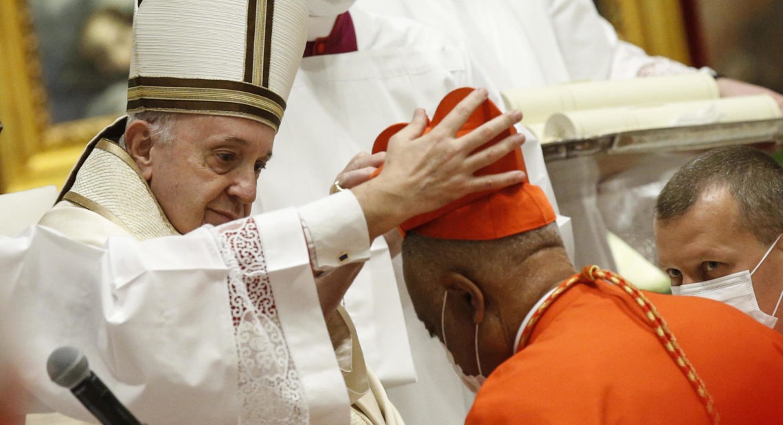 Archbishop Wilton Gregory of Washington, D.C., becomes a cardinal during a ceremony Saturday known as a consistory in St. Peter's Basilica at the Vatican. Pope Francis cautioned new cardinals never to lose their connection to the people. CREDIT: Fabio Frustaci/Pool/AFP via Getty Images