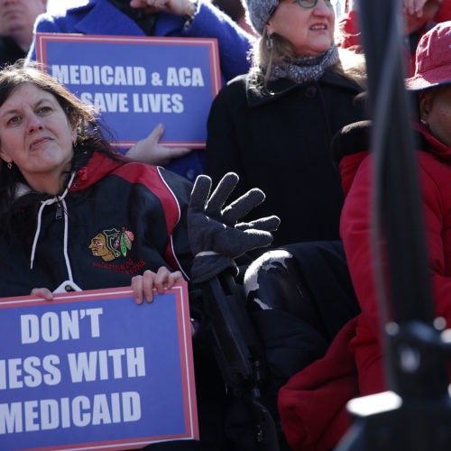 Health care activists rallied in front of the U.S. Capitol on March 22, 2017, to protest Republican efforts that would have dismantled the Affordable Care Act and capped federal payments for Medicaid patients. The Republican congressional bills, part of the party's "repeal and replace" push in 2017, were eventually defeated. CREDIT: Alex Wong/Getty Images