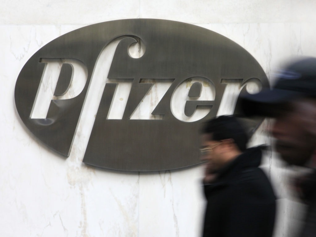 In this photo from Monday, Jan. 31, 2011, the Pfizer logo is displayed at the drug company's world headquarters in New York. Pfizer Inc. said Tuesday, Feb. 1, its fourth-quarter profit nearly quadrupled from a year ago when it was weighed down by charges as revenue rose 6 percent, thanks to the addition of products from fellow drugmaker Wyeth, acquired late in 2009. (AP Photo/Mark Lennihan)