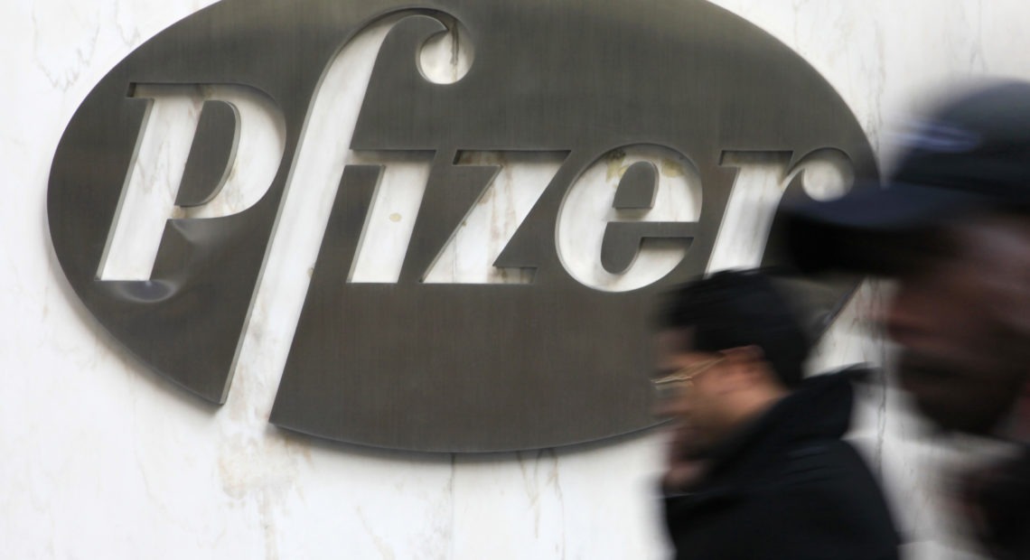 In this photo from Monday, Jan. 31, 2011, the Pfizer logo is displayed at the drug company's world headquarters in New York. Pfizer Inc. said Tuesday, Feb. 1, its fourth-quarter profit nearly quadrupled from a year ago when it was weighed down by charges as revenue rose 6 percent, thanks to the addition of products from fellow drugmaker Wyeth, acquired late in 2009. (AP Photo/Mark Lennihan)