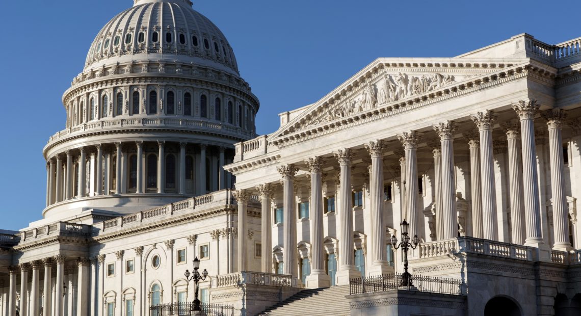 The Senate side of the Capitol is seen in Washington, D.C., early Monday. Experts say President-elect Joe Biden's ability to reshape the U.S. immigration system will be sharply limited if Republicans retain control of the Senate. CREDIT: J. Scott Applewhite/AP