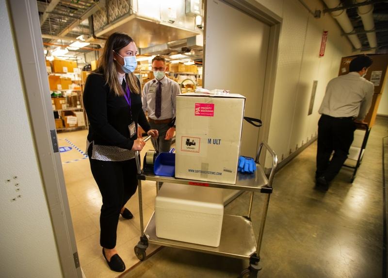 The first shipment of COVID vaccines arriving at the UW Medical Center in Seattle on December 14, 2020. CREDIT: Pool/Courtesy UW Medicine