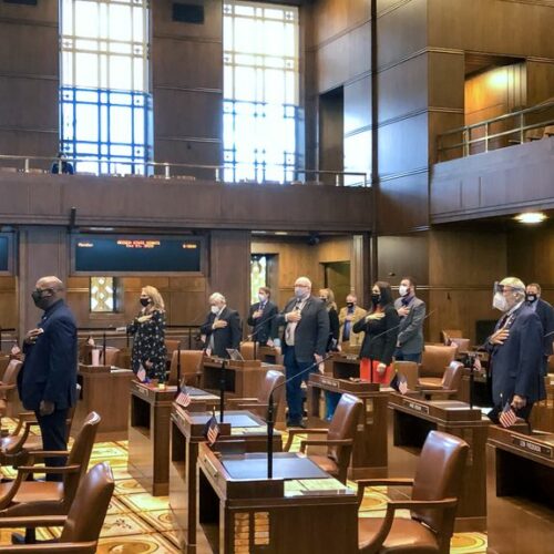 Oregon senators convene at the Capitol on Monday, Dec. 21, 2020 during a one-day special session to address specific COVID-19 relief issues. Protesters against coronavirus safety measures broke doors and tried to force their way inside. CREDIT: Dirk VanderHart/OPB