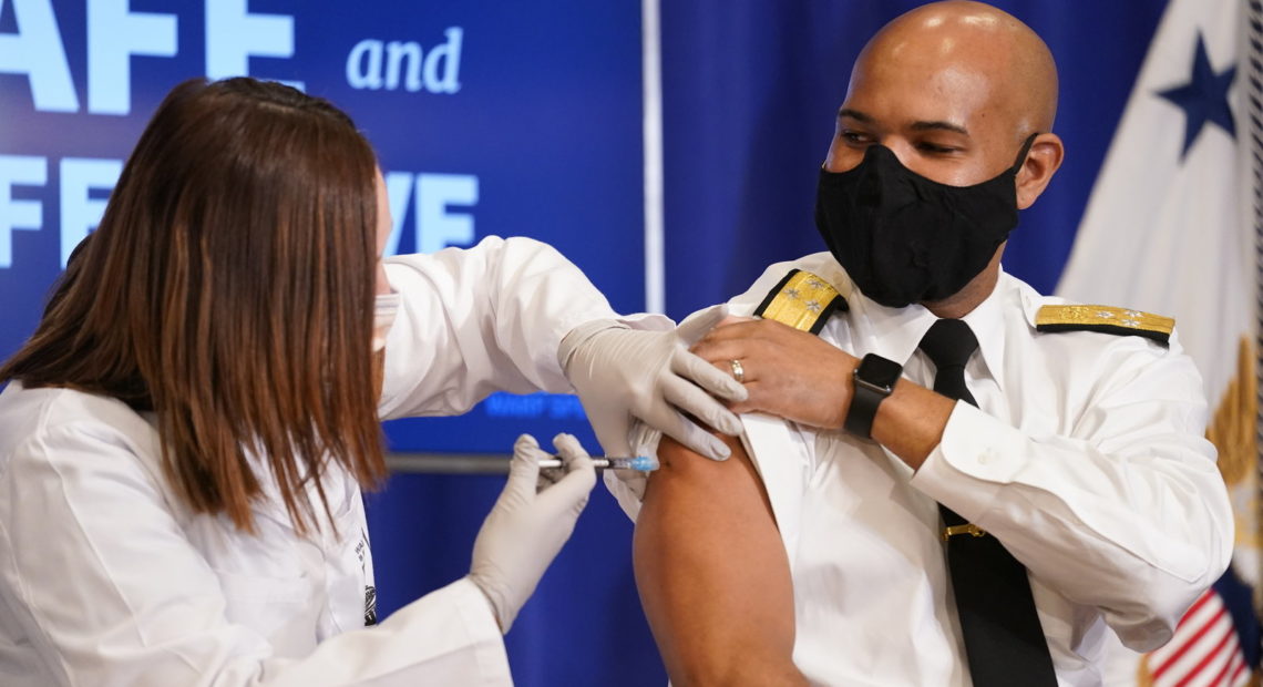 U.S. Surgeon General Jerome Adams said the symbolic significance of his vaccination was important in sending a message to Black Americans that it is safe. CREDIT: Andrew Harnik/AP