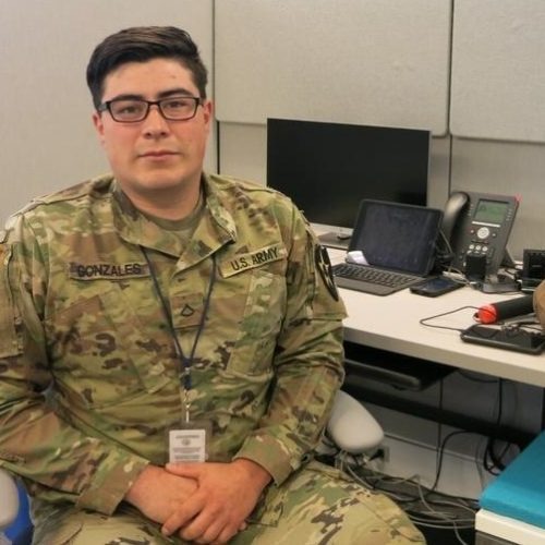 Washington National Guard Pfc. Dominic Gonzales worked as a contact tracer at the state Department of Health in Tumwater in May 2020. CREDIT: Anna Boiko-Weyrauch/KUOW