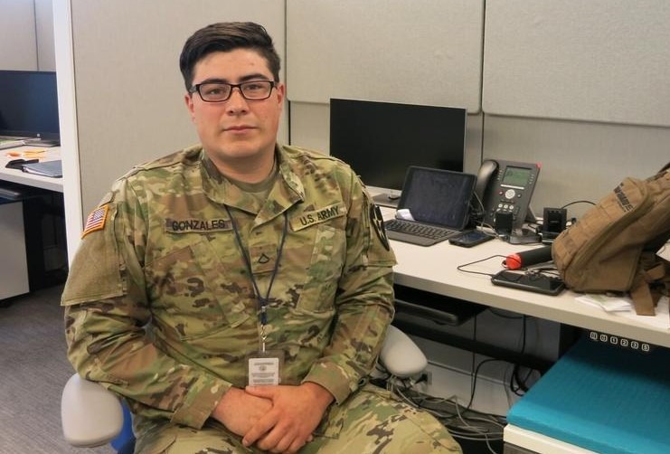 Washington National Guard Pfc. Dominic Gonzales worked as a contact tracer at the state Department of Health in Tumwater in May 2020. CREDIT: Anna Boiko-Weyrauch/KUOW