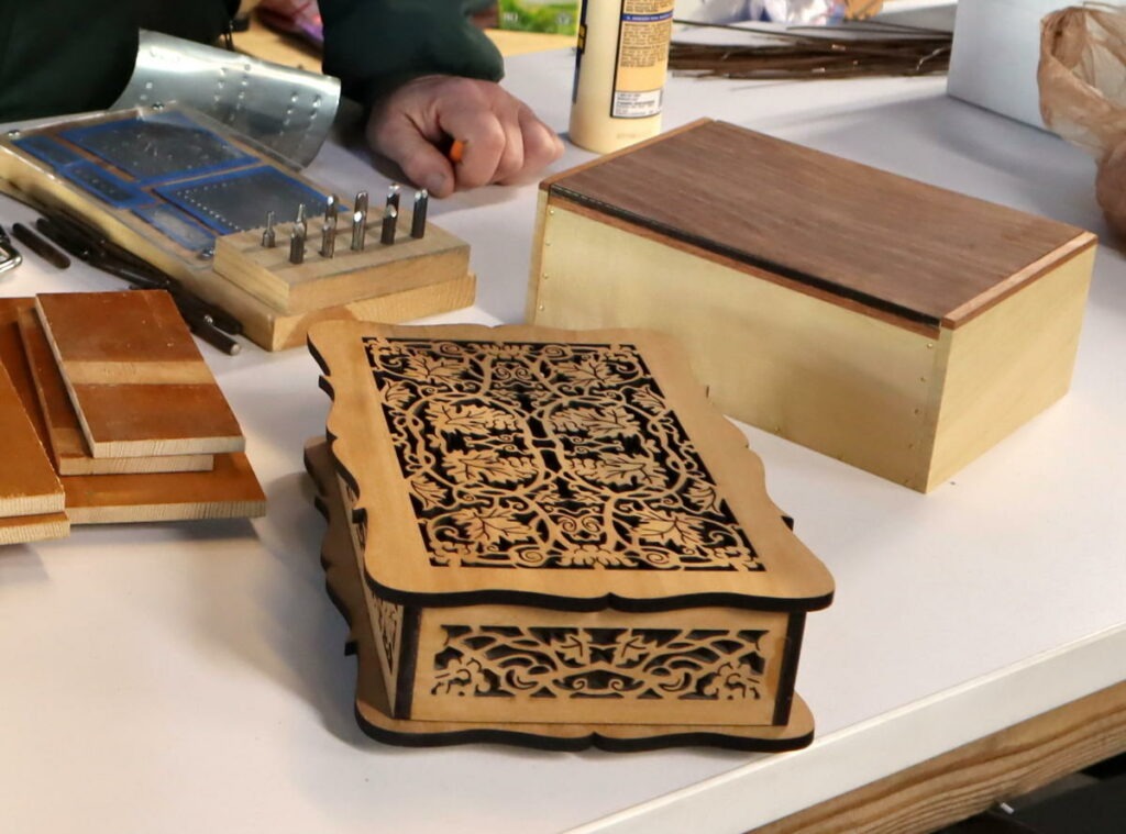Wood boxes crafted from scraps salvaged from an old piano.