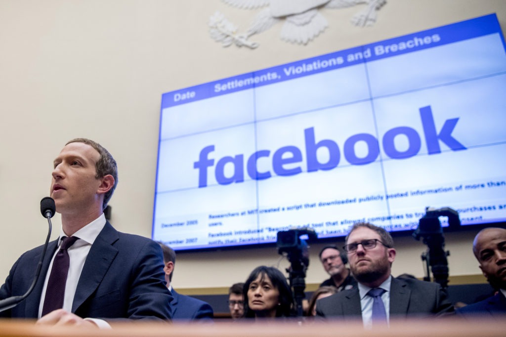 Facebook CEO Mark Zuckerberg testifies before a House Financial Services Committee hearing in 2019. CREDIT: Andrew Harnik/AP