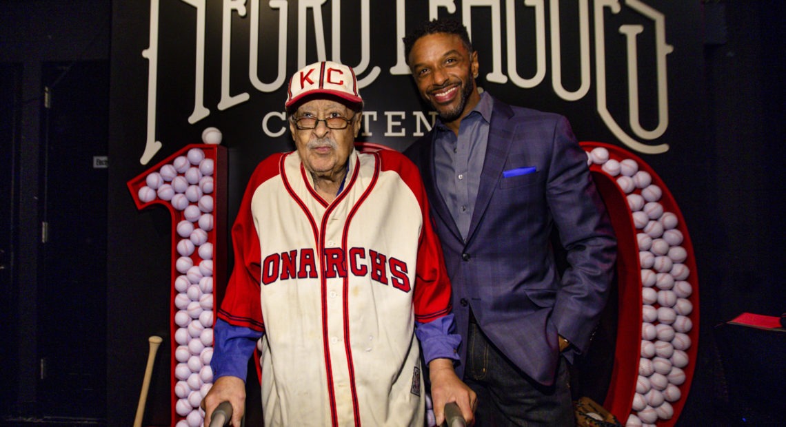 Negro Leagues baseball veteran Jim Robinson, left, and ESPN/ABC correspondent Ryan Smith, seen in New York in February. CREDIT: Donald Traill/AP