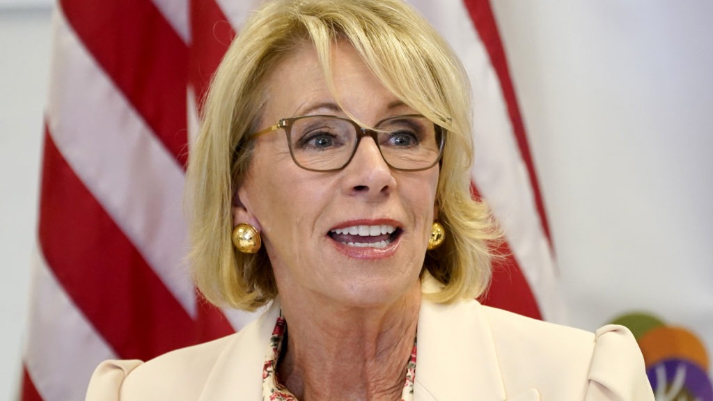 Secretary of Education Betsy DeVos appears in Phoenix in October. On Friday, the Education Department announced an extension of pandemic relief measures for federal student loan borrowers. Matt York/AP