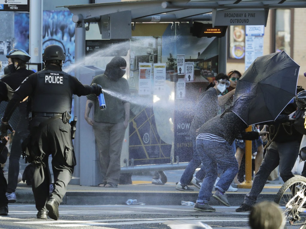 The decision on Monday was a partial victory for Black Lives Matter protesters but Judge Richard Jones found that in several instances, Seattle Police Department officers were justified in their use of less lethal weapons. Ted S. Warren/AP