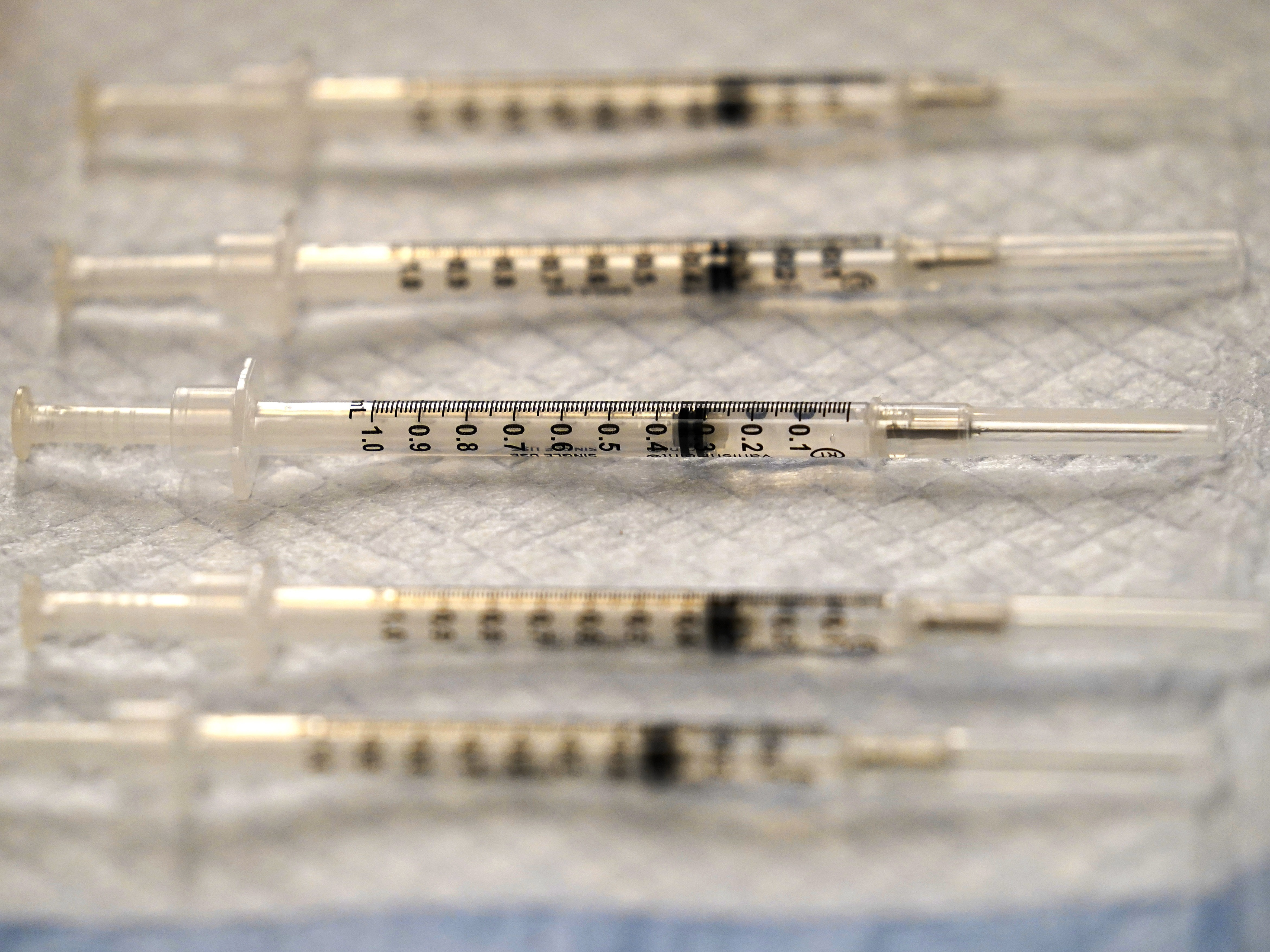 Prepared COVID-19 Pfizer-BioNTech vaccine syringes are seen at Edward Hospital in Naperville, Ill., Thursday, Dec. 17, 2020. Illinois received about 43,000 doses in its first shipment of a COVID-19 vaccine Monday as health officials reported another 103 coronavirus deaths statewide. Most of the shots will be distributed to local health care centers for health care workers, according to Illinois Gov. J.B. Pritzker's office. CREDIT: Nam Y. Huh/AP