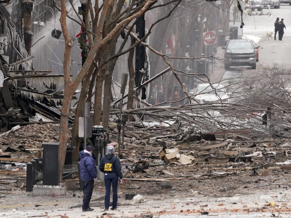 Emergency personnel work near the scene of an explosion in downtown Nashville, Tenn., on Dec. 25. CREDIT: Mark Humphrey/AP