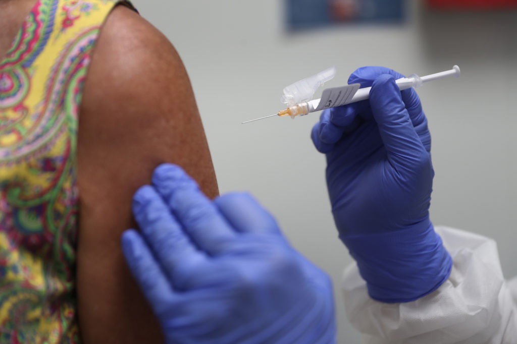 Lisa Taylor got a COVID-19 vaccination in August as part of a vaccine study at Research Centers of America in Hollywood, Fla. CREDIT: Photo by Joe Raedle/Getty Images