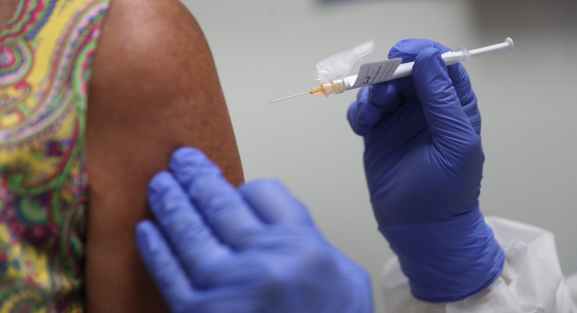 Lisa Taylor got a COVID-19 vaccination in August as part of a vaccine study at Research Centers of America in Hollywood, Fla. CREDIT: Photo by Joe Raedle/Getty Images