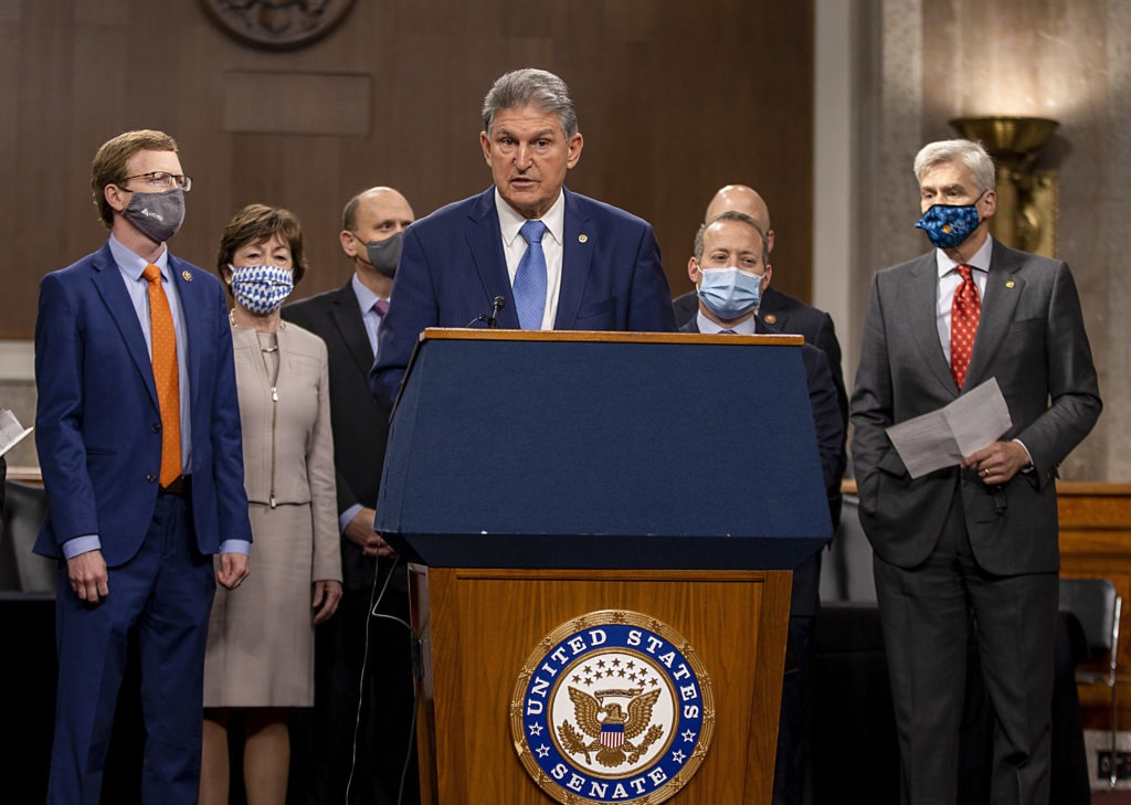 West Virginia Sen. Joe Manchin with group of Democratic and Republican senators