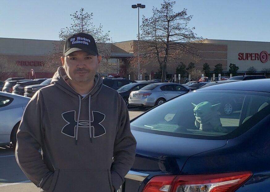 Willy Solis outside his workplace in a parking lot