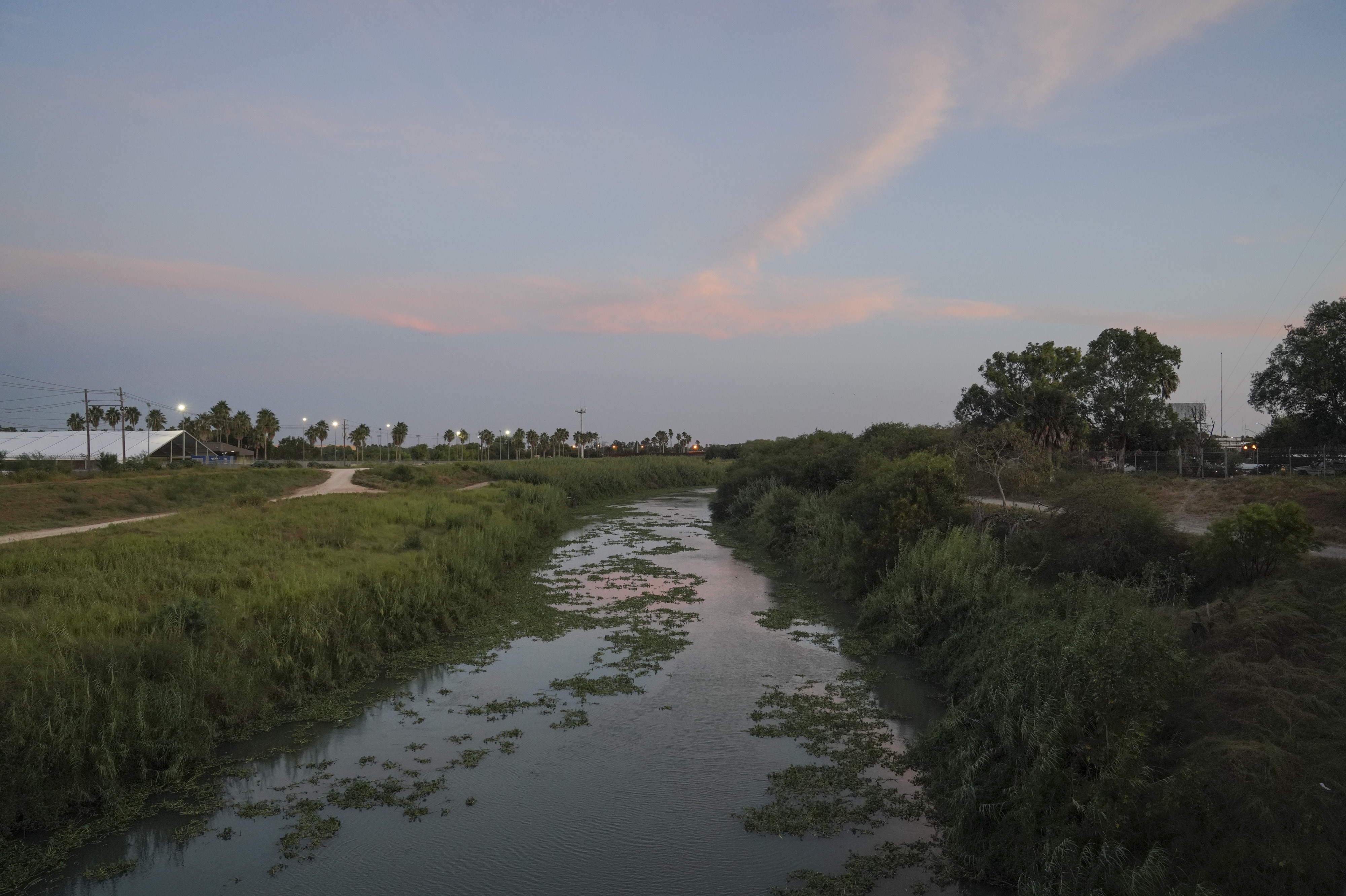 The Rio Grande as seen from the Gateway International Bridge in Matamoros, Mexico, in 2019. A mother and her four daughters from Honduras crossed the river nearly three years ago to seek asylum. The daughters were released from a federally funded shelter and placed with their father in Virginia. Their mother is in a shelter in Honduras.