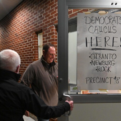 Caucus goers during last year's disastrous Iowa Democratic caucus. Democrats are now weighing whether the predominantly white, rural state should keep its prized place at the front of the presidential nominating process. Steve Pope/Getty Images