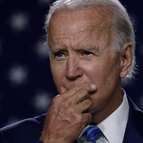 Then presidential candidate Joe Biden speaks at a "Build Back Better" Clean Energy event on July 14, 2020. On Thursday, Biden unveiled an ambitious economic plan just days before he's set to be inaugurated as president. CREDIT: Olivier Douliery/AFP via Getty Images