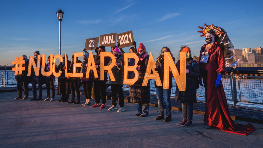 People hold letters reading #NUCLEARBAN in New York City, in support of the Treaty on the Prohibition of Nuclear Weapons, which took effect on Friday. Erik McGregor/LightRocket via Getty Images