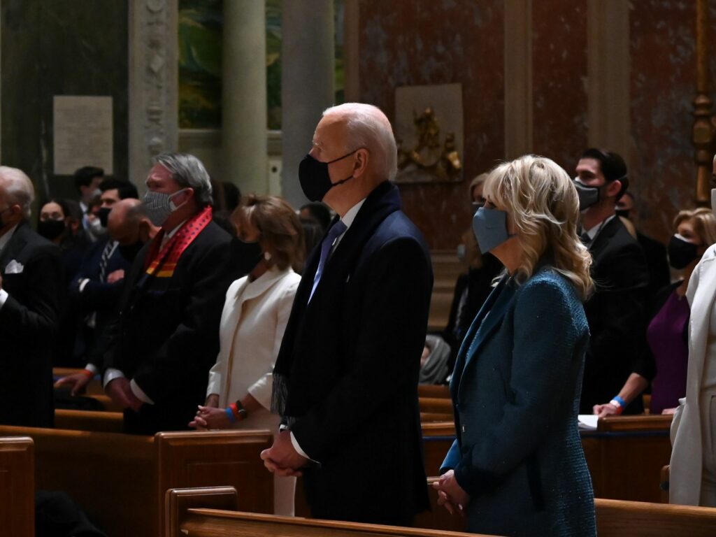 Joe and Jill Biden attend Mass at the Cathedral of St. Matthew the Apostle in Washington, D.C., on Wednesday morning before his inauguration. Jim Watson/AFP via Getty Images