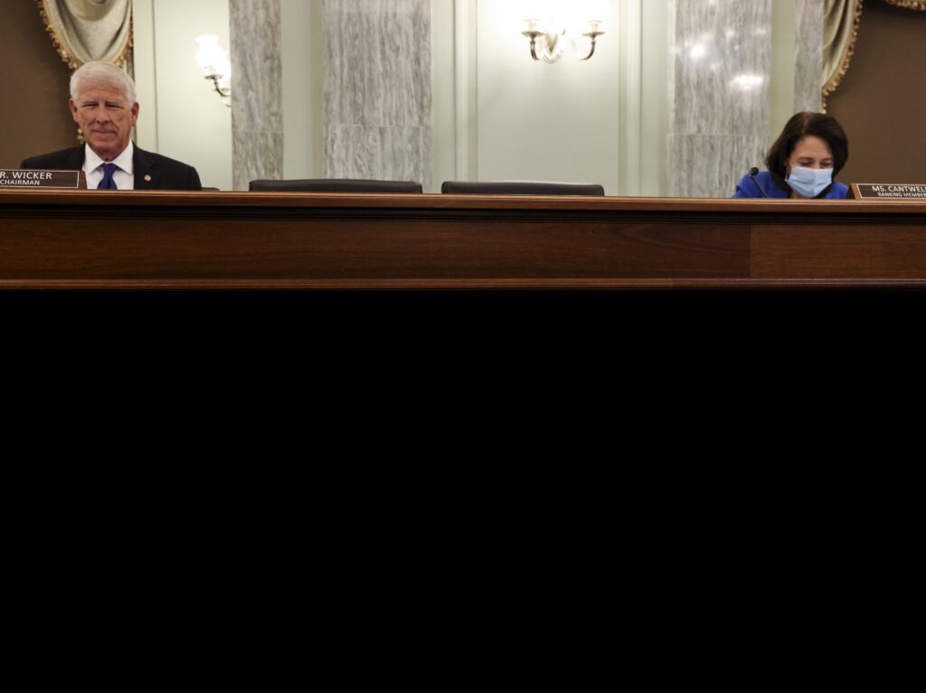 Rhode Island Gov. Gina Raimondo appears through video conferencing Tuesday during a Senate hearing for her nomination as the secretary for the Commerce Department, which oversees the U.S. Census Bureau. Jonathan Ernst/Bloomberg via Getty Images