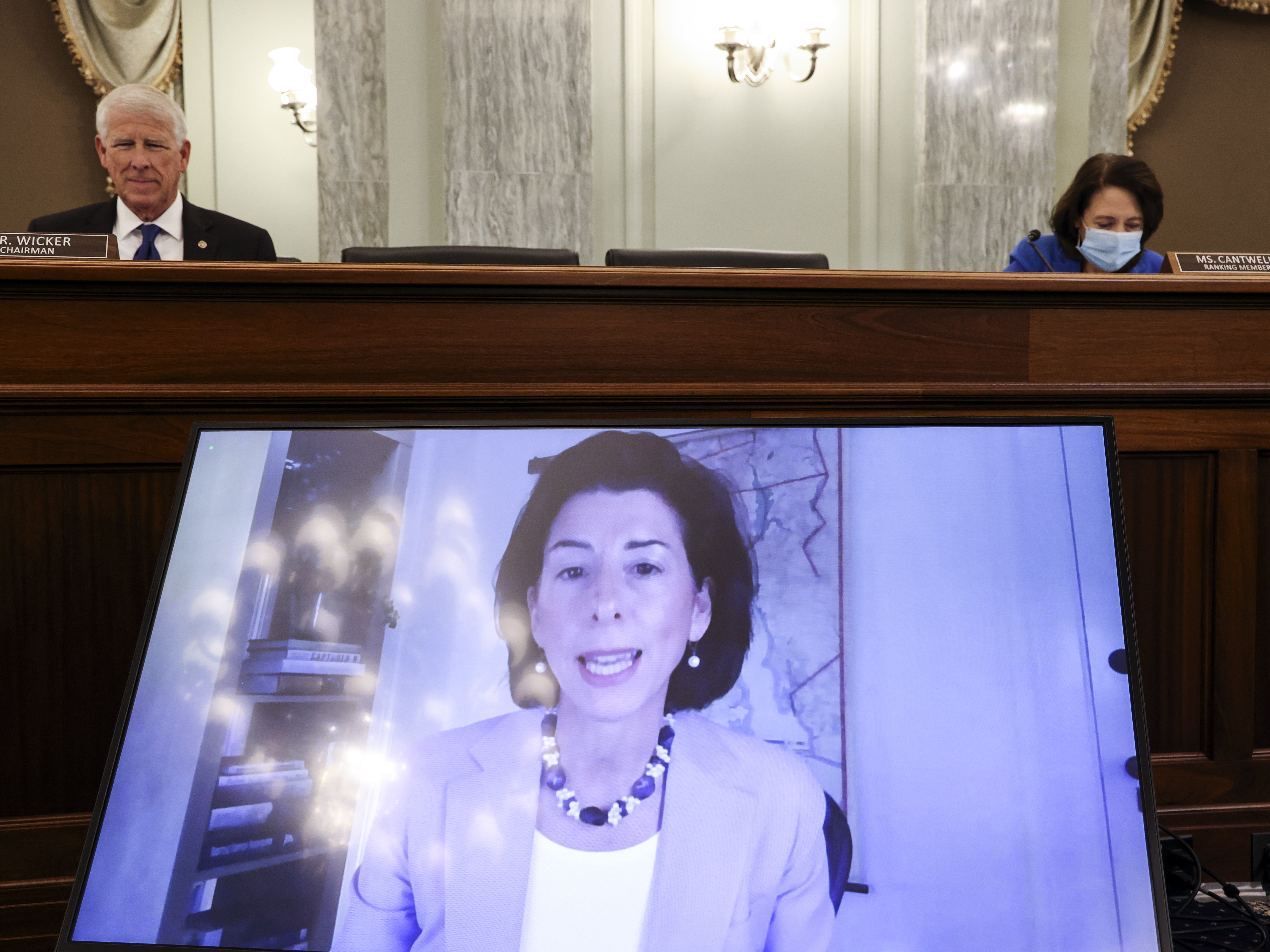 Rhode Island Gov. Gina Raimondo appears through video conferencing Tuesday during a Senate hearing for her nomination as the secretary for the Commerce Department, which oversees the U.S. Census Bureau. Jonathan Ernst/Bloomberg via Getty Images