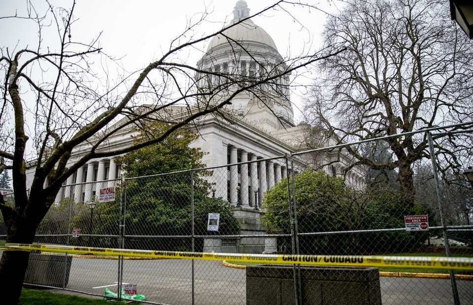 The Washington State Capitol Building and Campus in Olympia has little activity on Inauguration Day on Jan. 20, 2021. CREDIT: Dorothy Edwards/Crosscut