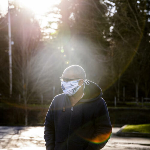 Ramón Núñez is currently driving for food delivery services to make money after switching from driving for Uber in order to lessen his exposure to COVID-19. He is photographed in Issaquah on Jan. 27, 2021. He is one of about 60,000 undocumented immigrants to get funds from the state during the pandemic. CREDIT: Dorothy Edwards/Crosscut