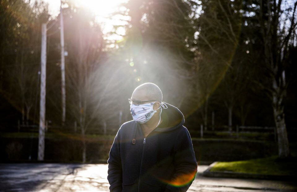Ramón Núñez is currently driving for food delivery services to make money after switching from driving for Uber in order to lessen his exposure to COVID-19. He is photographed in Issaquah on Jan. 27, 2021. He is one of about 60,000 undocumented immigrants to get funds from the state during the pandemic. CREDIT: Dorothy Edwards/Crosscut