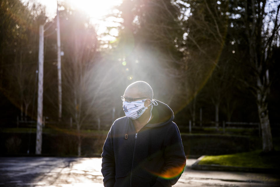 Ramón Núñez is currently driving for food delivery services to make money after switching from driving for Uber in order to lessen his exposure to COVID-19. He is photographed in Issaquah on Jan. 27, 2021. He is one of about 60,000 undocumented immigrants to get funds from the state during the pandemic. CREDIT: Dorothy Edwards/Crosscut