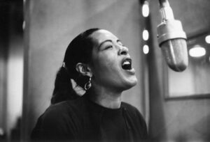 Singer Billie Holiday records her penultimate album "Lady in Satin" at the Columbia Records studio in New York City, in 1957. CREDIT: Michael Ochs Archives/Getty Images