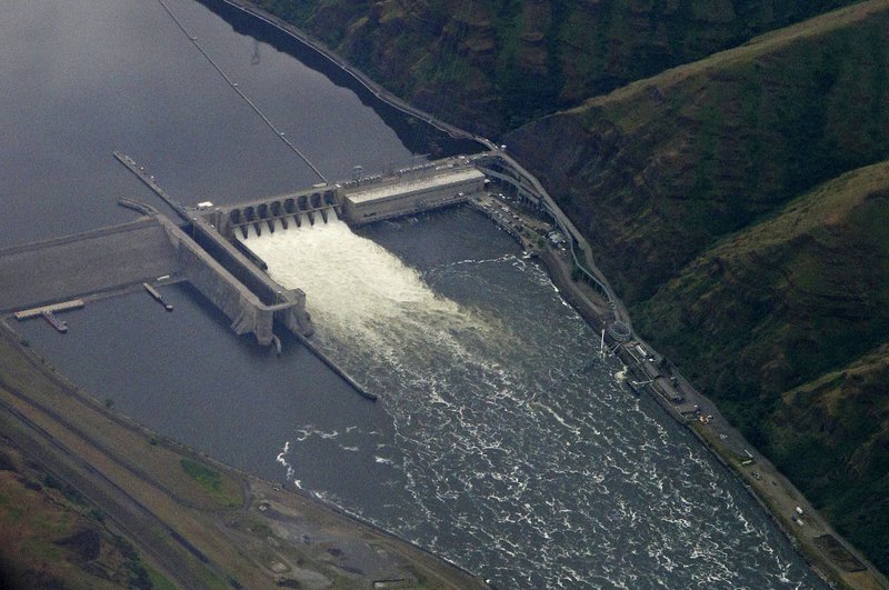 In this May 15, 2019 the Lower Granite Dam on the Snake River is seen from the air near Colfax, Wash. In early 2021, Republican Congressman Mike Simpson of Idaho proposed removing four hydroelectric dams on the Lower Snake River in Washington as part of a sweeping plan to save salmon populations and provide aid to farmers and others. CREDIT: Ted S. Warren