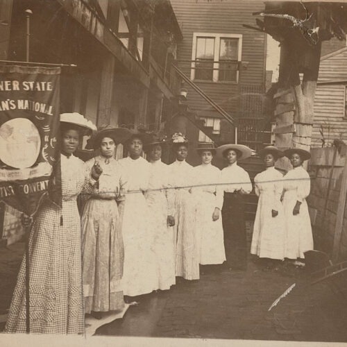 Dated between 1905 and 1915, this photo shows Nannie Helen Burroughs holding a banner that reads, “Banner State Woman’s National Baptist Convention.” Photo courtesy of Library of Congress