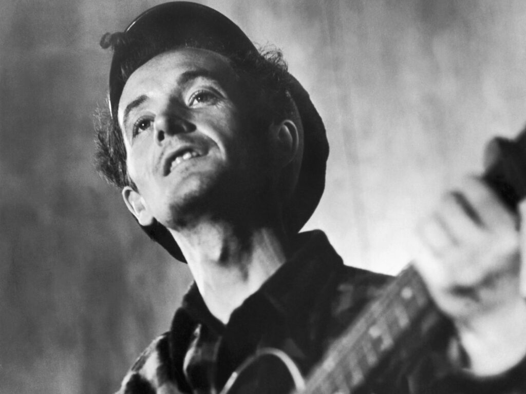 Picture of Woody Guthrie performing