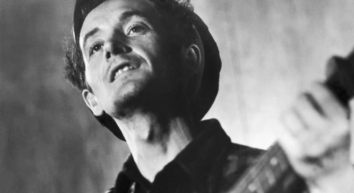 Picture of Woody Guthrie performing