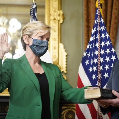 Jennifer Granholm is sworn in as energy secretary Thursday. Granholm told NPR that pivoting to a clean energy economy could ensure a dependable grid and help create jobs. Andrew Harnik/AP