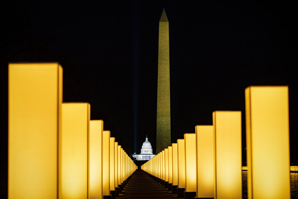 On Jan. 19, the incoming Biden administration hosted memorial to lives lost to COVID-19 at the Lincoln Memorial Reflecting Pool on the National Mall. Since then another 100,000 Americans have died. Al Drago/Bloomberg via Getty Images