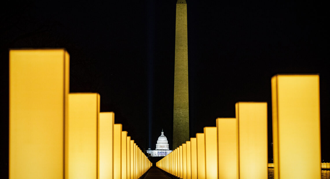 On Jan. 19, the incoming Biden administration hosted memorial to lives lost to COVID-19 at the Lincoln Memorial Reflecting Pool on the National Mall. Since then another 100,000 Americans have died. Al Drago/Bloomberg via Getty Images