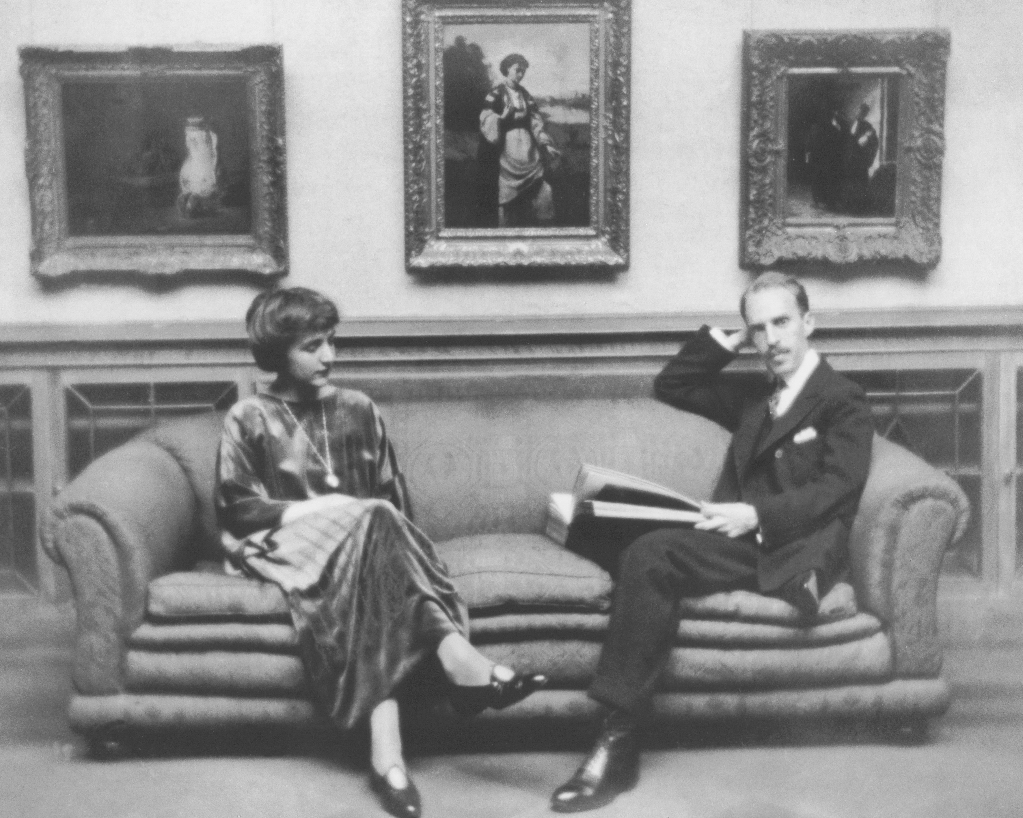 After the deaths of his father and brother in 1917 and 1918, Duncan Phillips found solace in art. His wife, Marjorie Phillips, was a painter. They opened The Phillips Collection in Washington, D.C., in 1921. They are pictured in the Main Gallery, circa 1920. CREDIT: The Phillips Collection