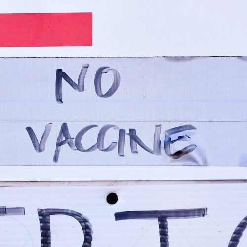 A sign at a vaccination site in Los Angeles reflects the holdup in vaccine distribution as a result of this week's storms. White House officials said Friday that the extreme weather delayed the shipment of some 6 million doses across the country. CREDIT: Frederic J. Brown/AFP via Getty Images