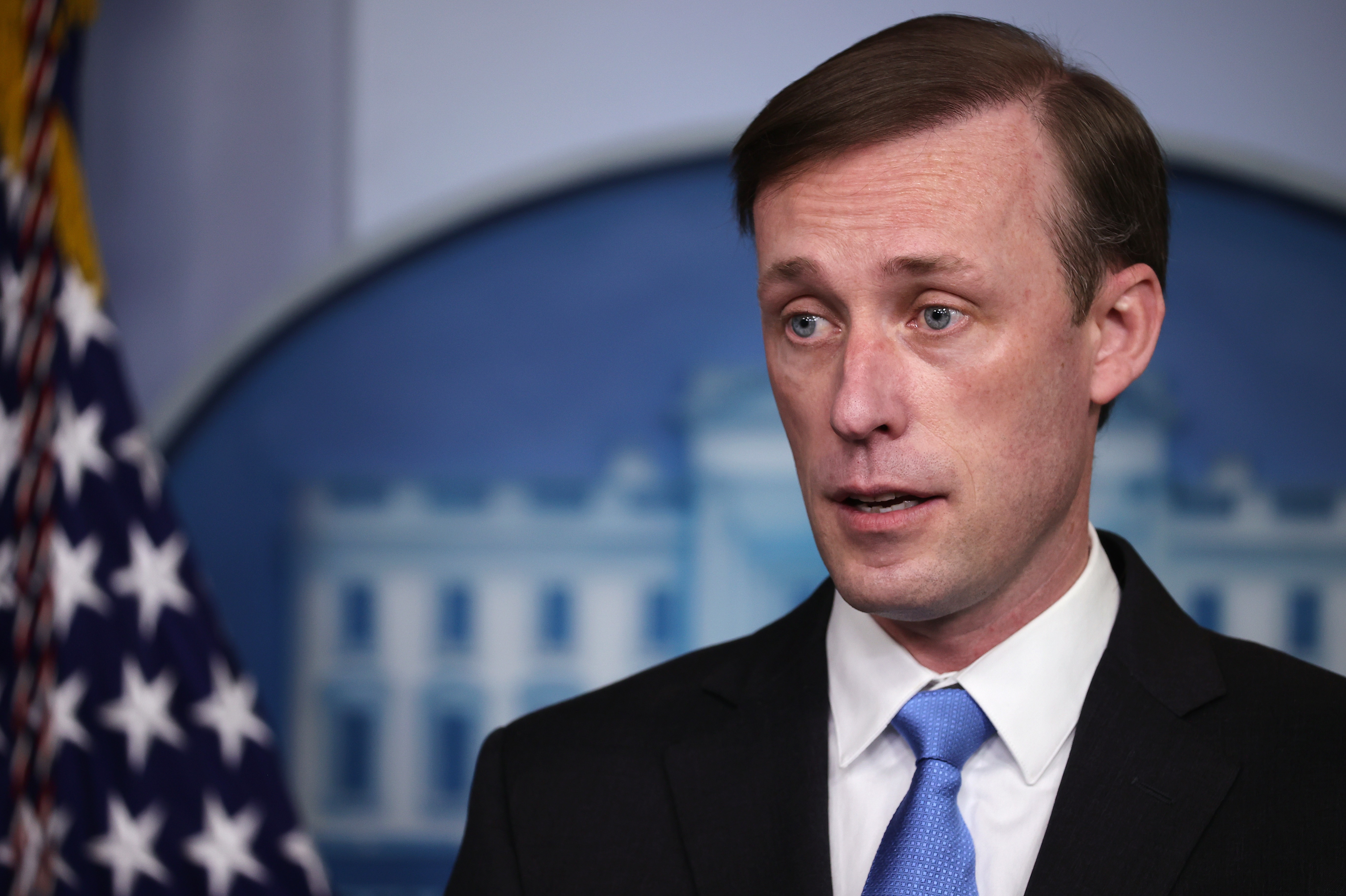 White House national security adviser Jake Sullivan, seen here during a press briefing on Feb. 4, told CBS the World Health Organization has more work to do to get to the bottom of where the coronavirus emerged. CREDIT: Chip Somodevilla/Getty Images