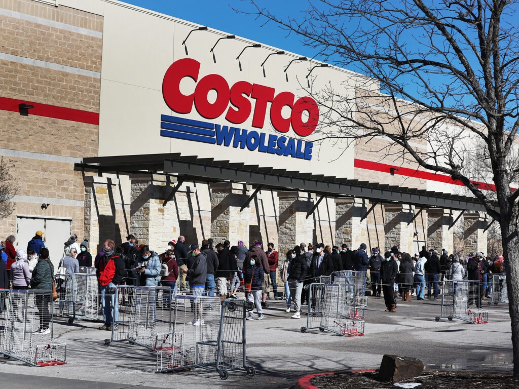 People wait to shop at the Costco Wholesale in Austin on Feb. 20.